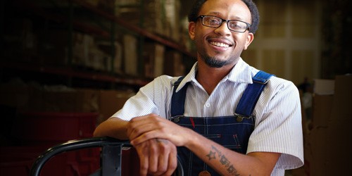 Man wearing overalls.